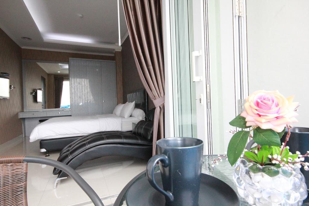 ג'קרטה Harvia Suites Kebon Jeruk מראה חיצוני תמונה