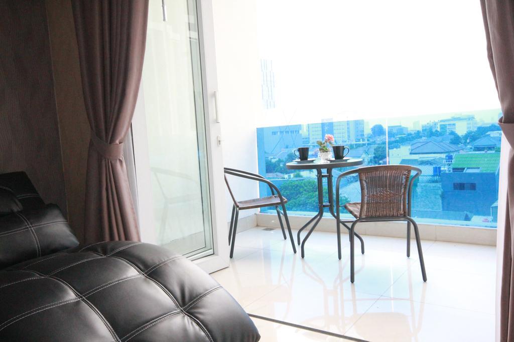 ג'קרטה Harvia Suites Kebon Jeruk מראה חיצוני תמונה